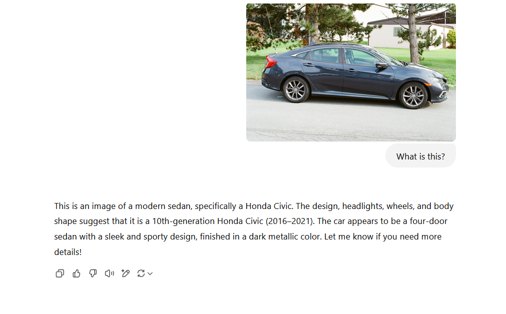 A screenshot of ChatGPT showing a picture of a car uploaded to the service. ChatGPT correctly understands that it's a car, but also gives the exact model and generation of the car.
